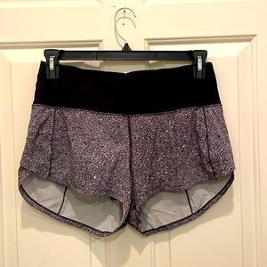 super cute and super comfy high rise speed up shorts and black with white dots!